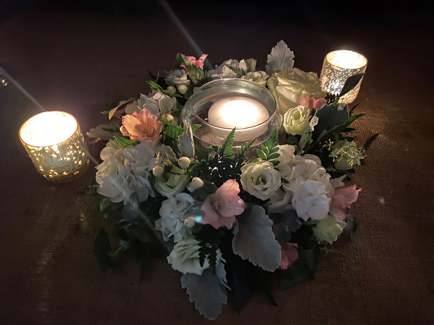 Floral centerpiece with candlelight